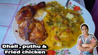 Making dhall curry , puthu( pap) and fried chicken for lunch.