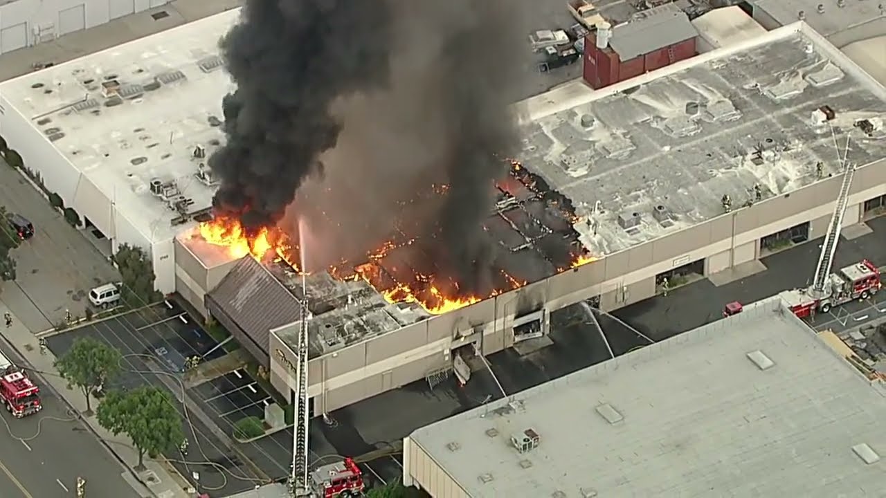 ⁣Firefighters battle large fire at Signal Hill commercial building