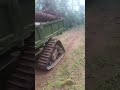 Triangular crawler tracks are modified on the tractor to improve hill climbing and obstacle clim