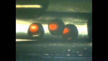 Controlled stimulation-burst targeted release by smart decentered core-shell microcapsules in gravit