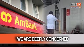 AmBank vows action after homeless man hosed down, kicked outside premises