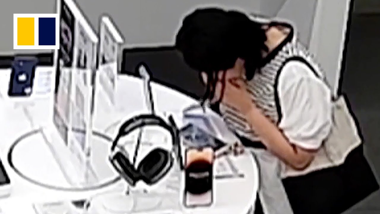 Japanese woman biting phone