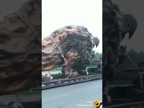 BIG   lion statue on the truck