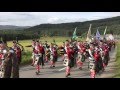 2016 Lonach and Atholl Highlanders march through Strathdon in the Cairngorms Scotland