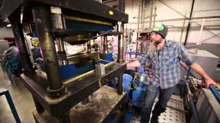Compression molding presses and curing ovens at Kitsap Composites, Inc. Profile