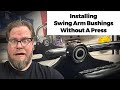 Install motorcycle swing arm bushings without a press