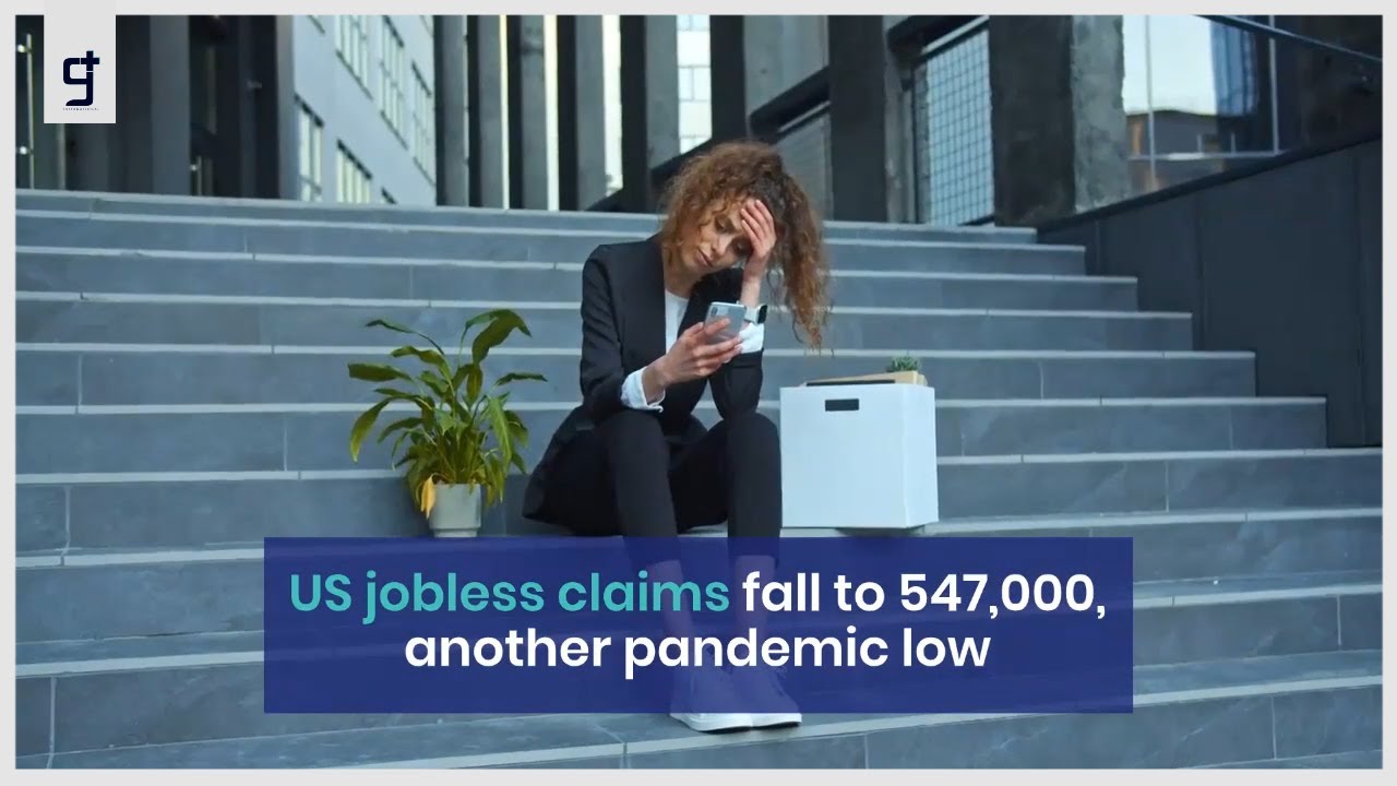 US jobless claims fall to 547,000, another pandemic low