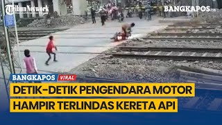 Detik-detik Pengendara Motor Hampir Terlindas Kereta Api