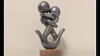 Sculpture metal a hug / Beeldhouwwerk metaal een knuffel