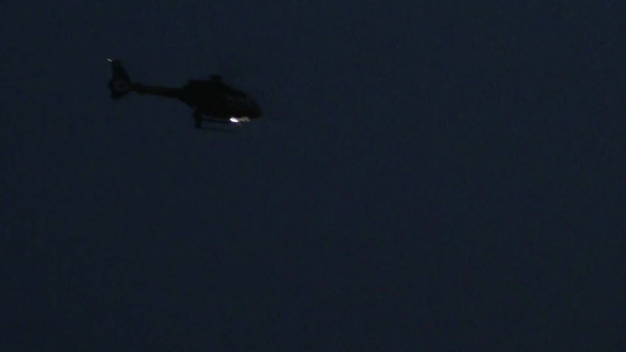 helicopter in the night city sky YouTube