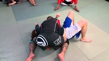 Reverse head and arm choke