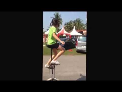 150627 KwangWah 105th Anniversary Carnival - Wei En on Giraffe unicycle