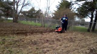How to use the rototiller without it popping up on you. going nice and
slow.