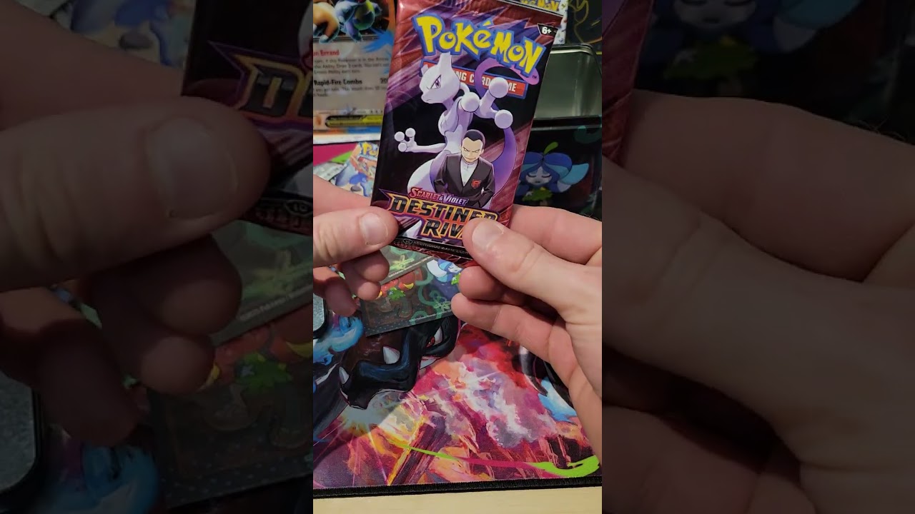 Pokémon card opening from a 3pack tin.