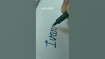 writing amazing name Ivory in cursive