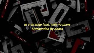 NIKI - Strange Land Lyrics | Acoustic Version