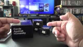 Cards Against Humanity and expansions 1-3 unboxing.