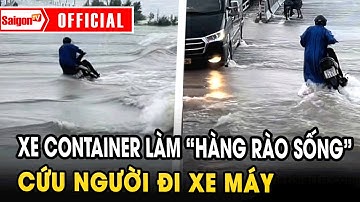 Hành động đẹp giữa lũ Huế xe container làm “hàng rào sống” cứu người đi xe máy | Tin tức SaigonTV