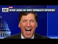 Tucker Carlson CACKLES At His White Supremacist Reputation