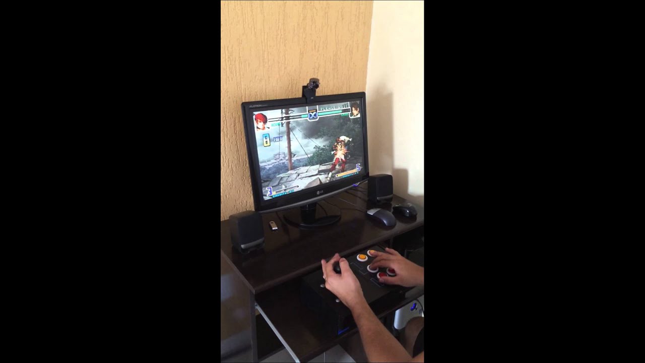 Controle arcade feito com carcaça de PS2.