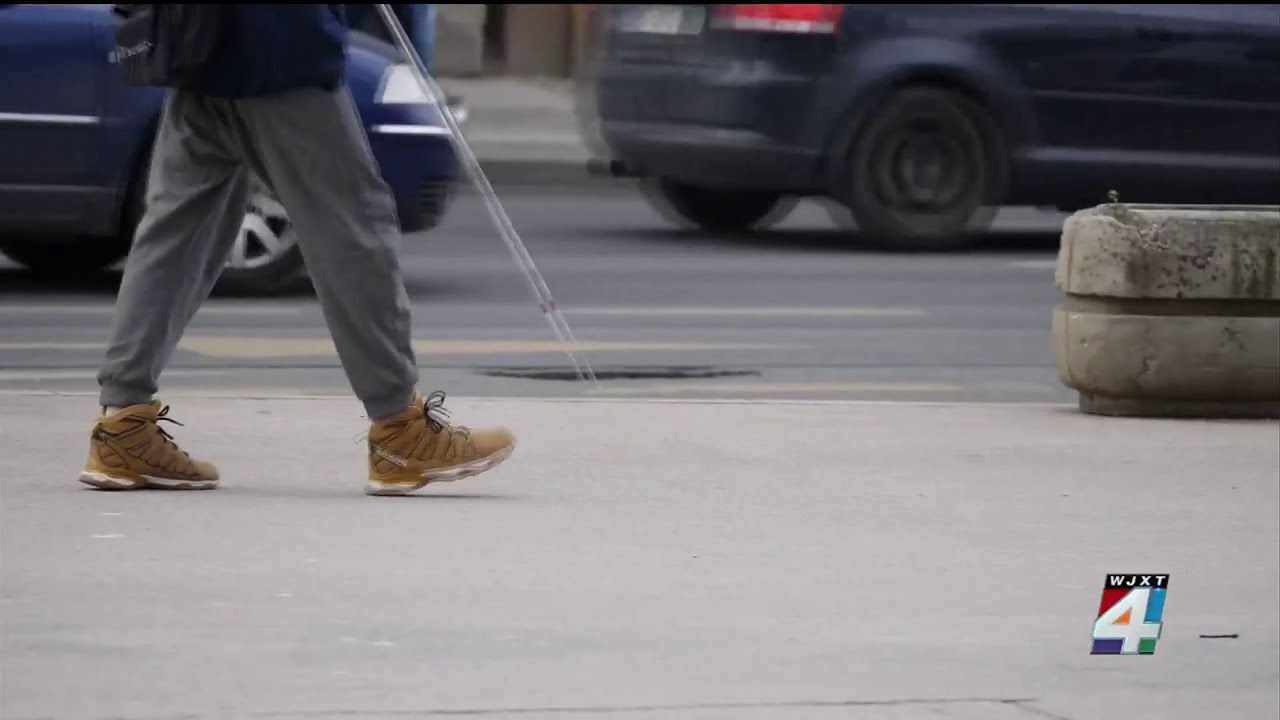 Jacksonville’s blind community takes a stroll to bring attention to