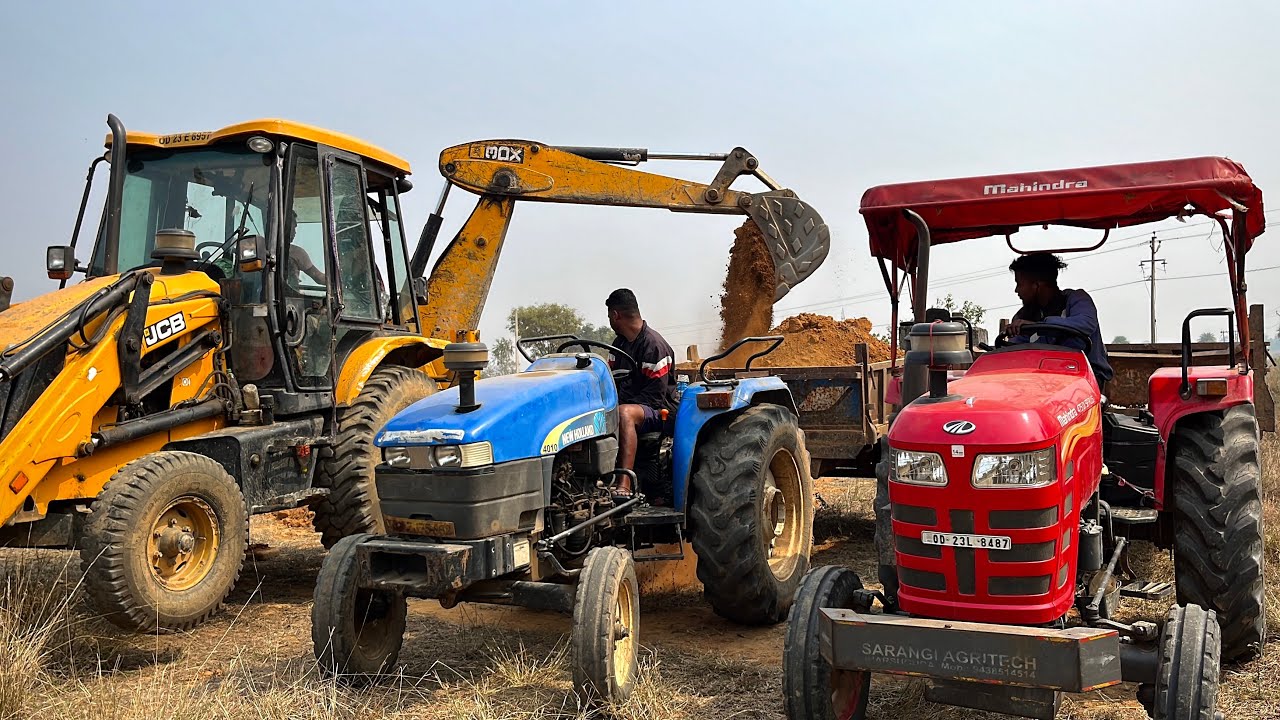 jcb-3dx-eco-excellence-loading-red-mud-in-mahindra-di-vs-newholland