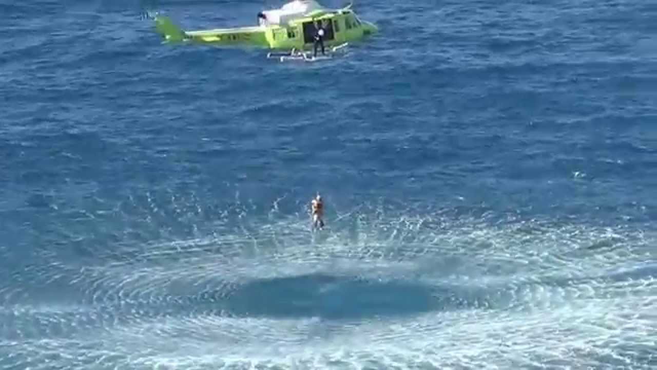 Rescue of 4 people from the surf by a helicopter - YouTube