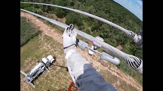 Barehand training on hot 345kv from a ladder.