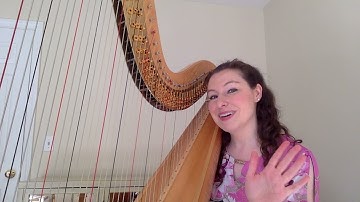 NMS harp faculty member Kaitlin Stern demonstrates how to play a glissando on the harp