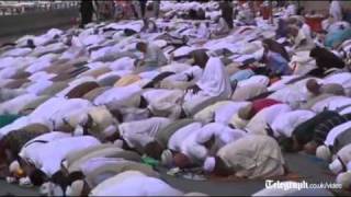Thousands of Muslims pray outside Mosque in Mecca ahead of Hajj pilgrimage.