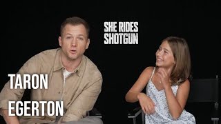 Taron Egerton & Ana Sophia Heger Get Into She Rides Shotgun & Taron Talks Superhero Roles