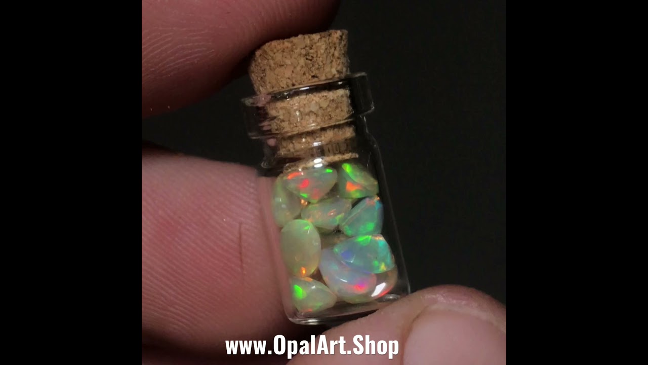 Miniature Jar of Faceted Ethiopian Welo Opal Gemstones