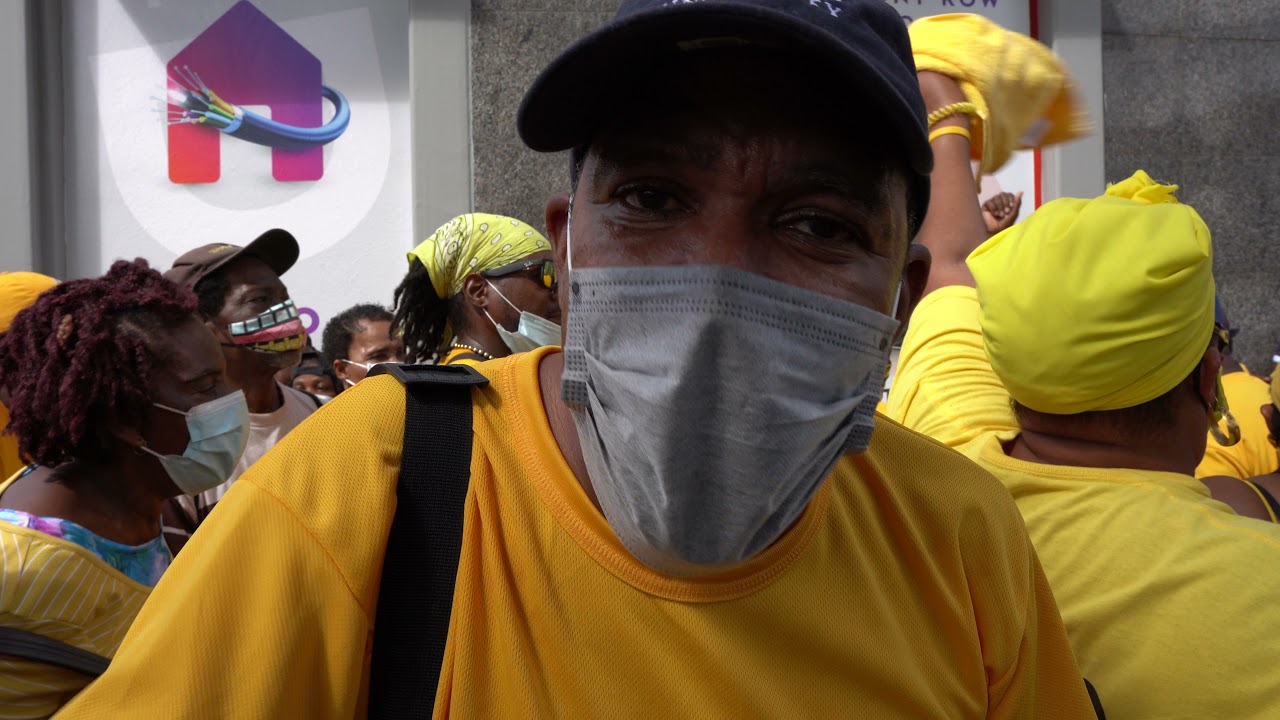 Therold Prudent speaks outside St. Lucia Parliament November 16, 2021