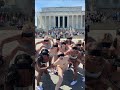 Bindfolded dancers protest Epstein, Trump
