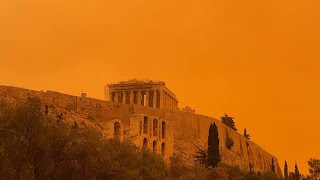 Skies over southern Greece turn orange as winds blow dust across from North Africa