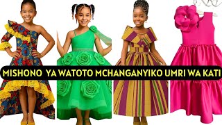 MISHONO  YA WATOTO  YA  VITAMBAA  NA  VITENGE MIZURI KWA WATOTO WA UMRI WA KATI.