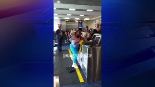 Woman arrested after assaulting American Airlines employee at MIA