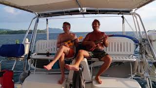 Sailing Along The Coast Of Phuket And Playing The Ukelele