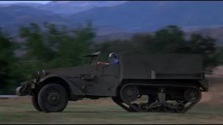 '79 Dodge St. Regis chases '41 White M2 Halftrack