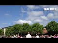 Widener graduates arrive at Memorial Field for commencement services.
