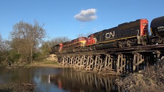 CANADIAN NATIONAL CROSSES OLD WOODEN BRIDGE AND RAIL YARD DEPARTURE WITH DRONE VIEWS!