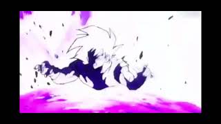 Turles fires a barrage of ki blasts at Goku.