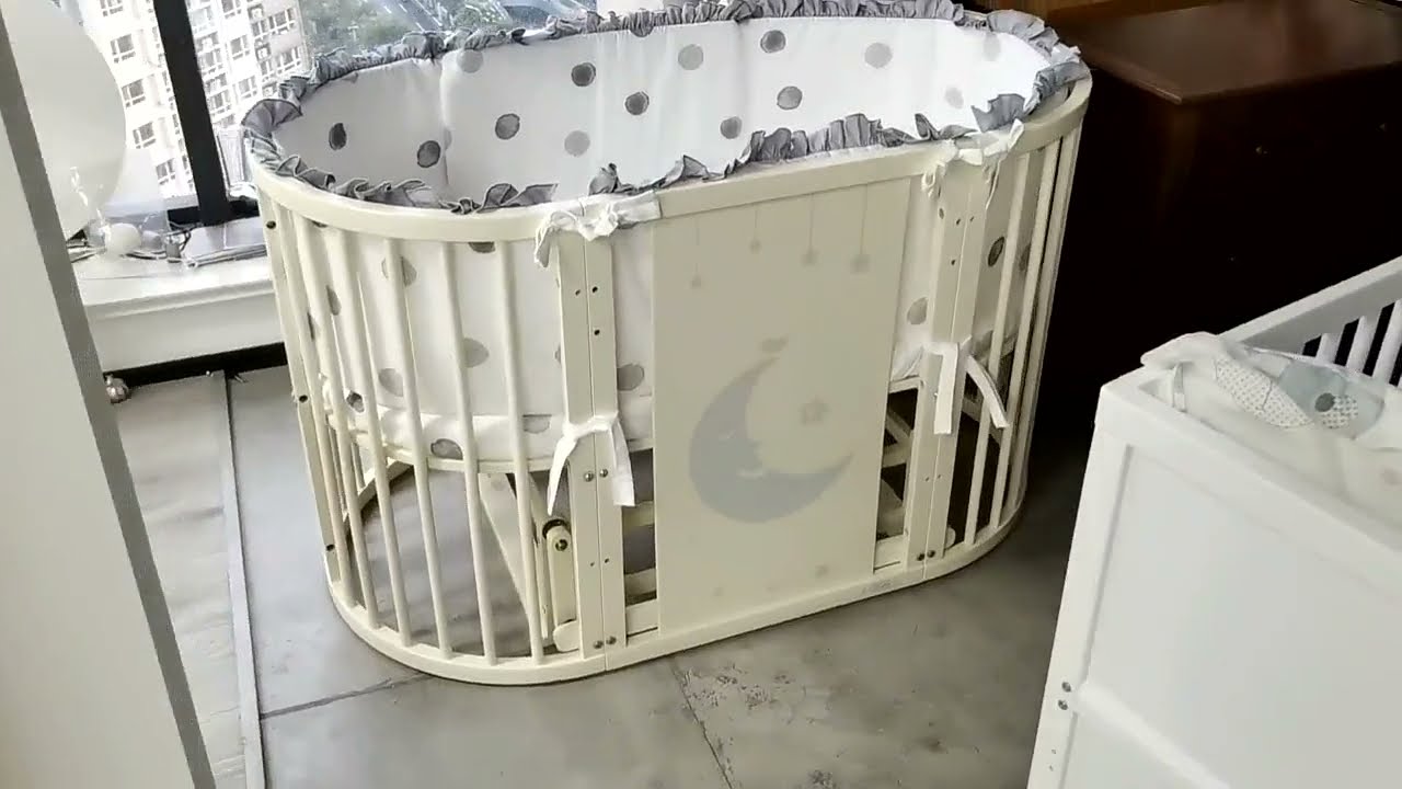 Convertible wooden round baby bed 7