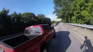 Red Toyota Tacoma Pickup Truck Buzzes Cyclist On July 30, 2019 In North Charleston, Sc