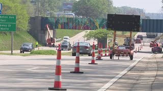 Artists begin transforming rusty railroad overpasses in Muskegon