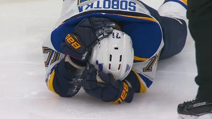 Blues' Sobotka leaves after taking a puck to the f...