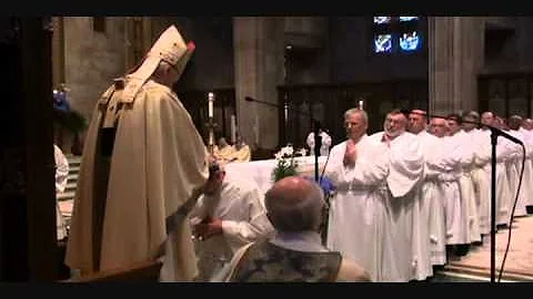 Archbishop O'Brien ordains 14 permanent deacons