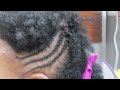 Cornrows on wet natural hair at the salon