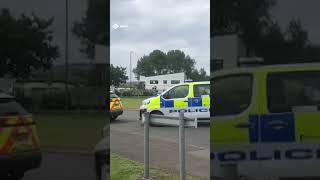 Arrests after activists 'concrete' themselves to road near oil refinery