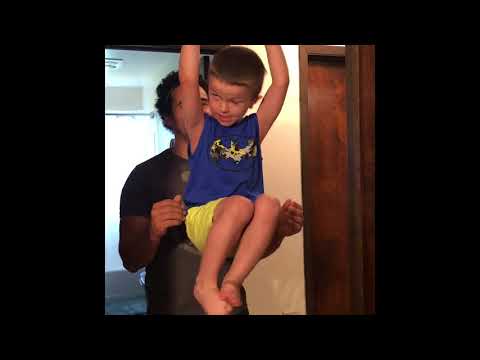 cute-4-year-old-funny-face-doing-pull-ups!